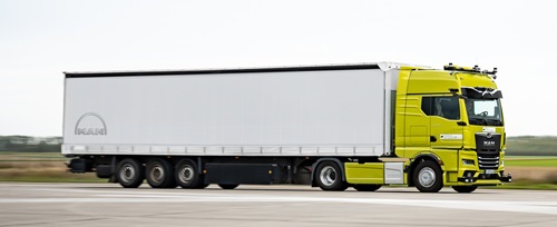 man-driverless-trucks-logging-on.jpg